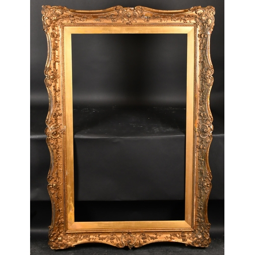 294 - 19th Century English School. A Gilt Composition Frame, with swept centres and corners, rebate 50