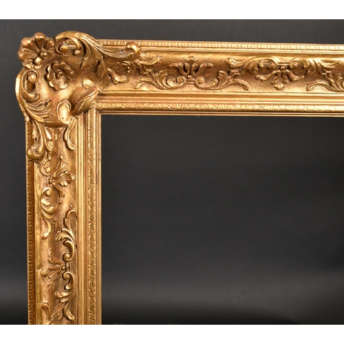 296 - 20th Century English School. A Gilt Composition Frame, with swept and pierced centres and corners, r... 