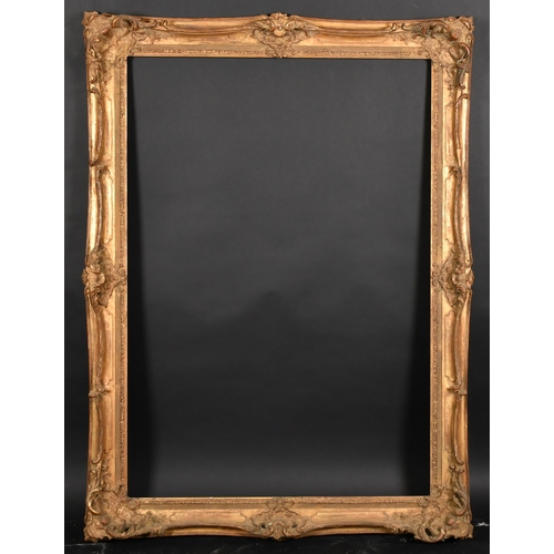 298 - 20th Century European School. A Gilt Composition Frame, with swept and pierced centres and corners, ... 