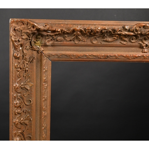 332 - Early 20th Century European School. A Gilt Composition Frame, with swept centres and corners, rebate... 