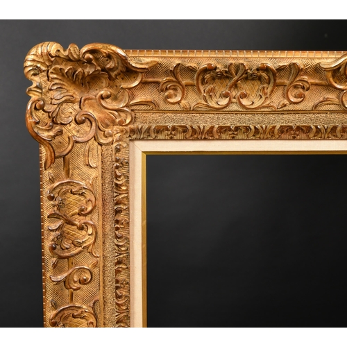 337 - 20th Century French School. A Louis Style Gilt Composition Frame, with swept centres and corners and... 