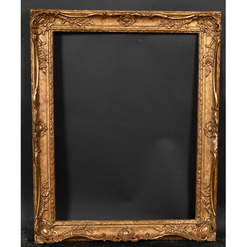 385 - 20th Century English School. A Gilt Composition Frame, with swept centres and corners, rebate 24