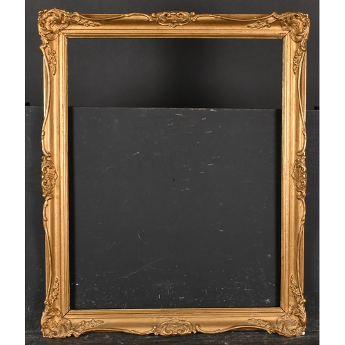 391 - 20th Century English School. A Gilt Composition Frame, with swept centres and corners, rebate 23