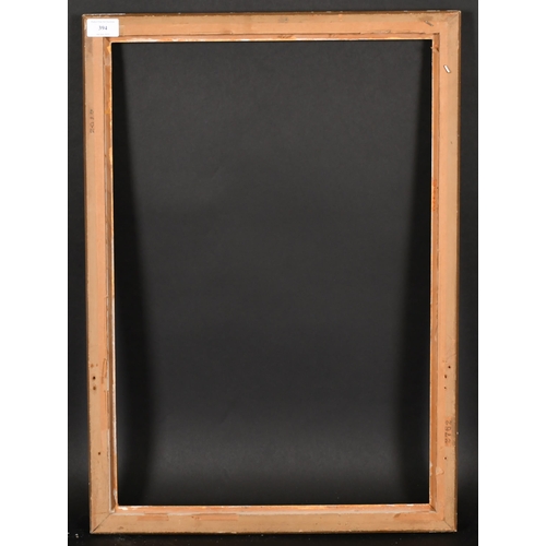 394 - 20th Century French School. A Louis Style Giltwood Frame, with flutes and paterae corners, rebate 23... 