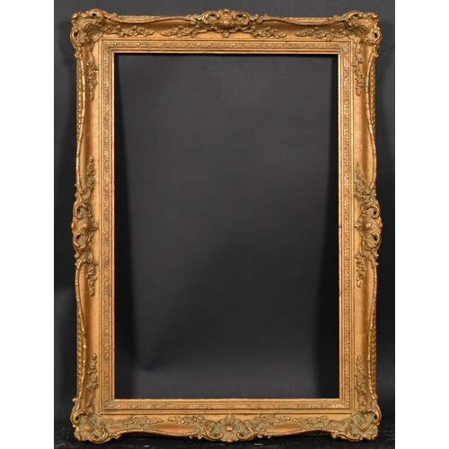 395 - 20th Century English School. A Gilt Composition Frame, with swept centres and corners, rebate 23