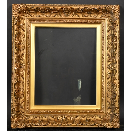 411 - 19th Century English School. A Gilt Composition Frame, with swept corners and inset glass, rebate 20... 