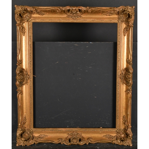 412 - 20th Century English School. A Gilt Composition Frame, with swept and pierced centres and corners, r... 