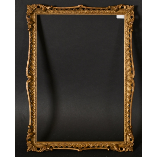 450 - 20th Century English School. A Carved Giltwood Frame, with swept and pierced centres and corners, re... 