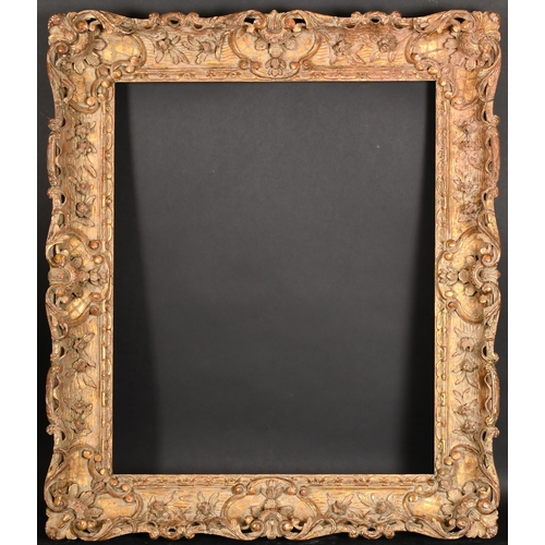 229 - 19th Century French School. A Carved Giltwood Frame, with swept centres and corners, rebate 30