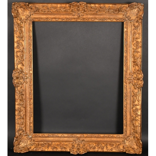 242 - Early 20th Century French School. A Louis Style Gilt Composition Frame, with swept centres and corne... 