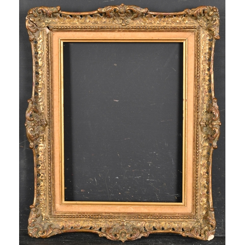 302 - 20th Century English School. A Gilt Composition Frame, with swept and pierced centres and corners, a... 