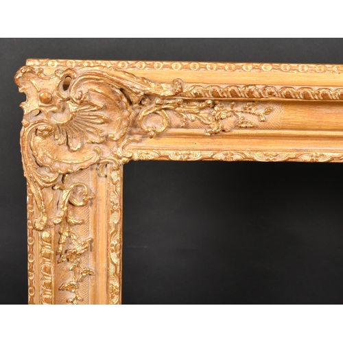 335 - 20th Century English School. A Gilt Composition Louis Style Frame, with swept corners, rebate 30