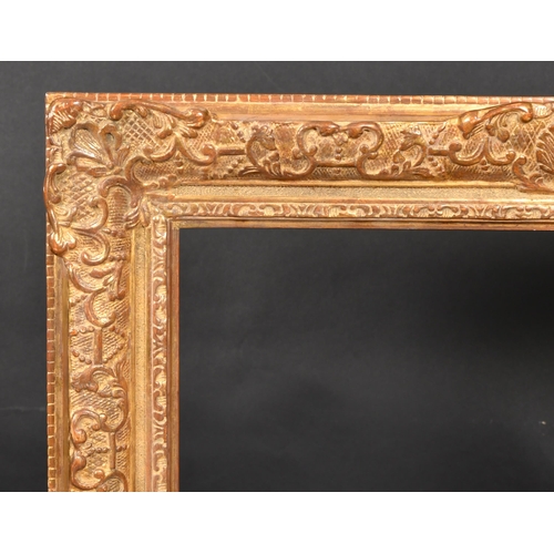 337 - 20th Century English School. A Gilt Composition Louis Style Frame, with swept centres and corners, r... 