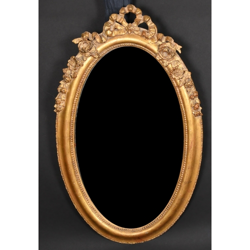 346 - 19th Century English School. A Gilt Composition Frame, with inset mirror glass, oval, rebate 26.5