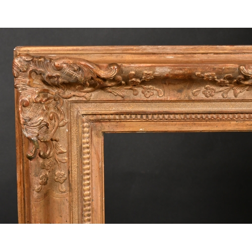 348 - 20th Century English School. A Gilt Composition Louis Style Frame, with swept centres and corners, r... 