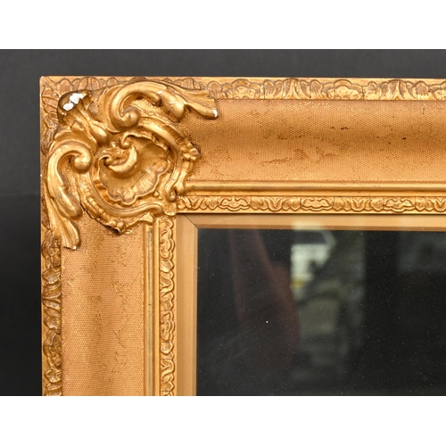 374 - 19th Century English School. A Gilt Composition Frame, with swept corners and inset glass, rebate 21... 