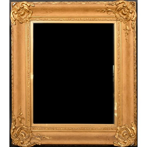 374 - 19th Century English School. A Gilt Composition Frame, with swept corners and inset glass, rebate 21... 