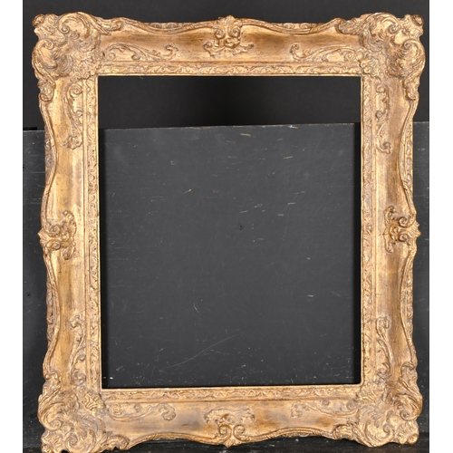 390 - 20th Century English School. A Gilt Composition Frame with swept centres and corners, rebate 19