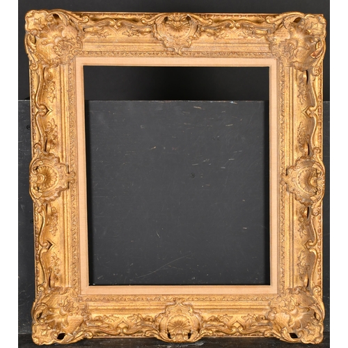 396 - 20th Century English School. A Gilt Composition Frame with swept and pierced centres and corners, re... 