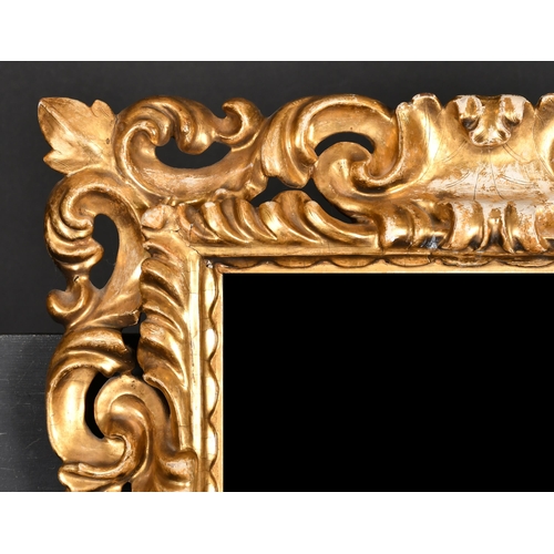 404 - 19th Century Italian School. A Carved Giltwood Florentine Frame, with inset mirror glass, rebate 16.... 