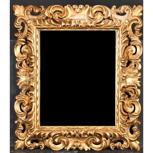 404 - 19th Century Italian School. A Carved Giltwood Florentine Frame, with inset mirror glass, rebate 16.... 