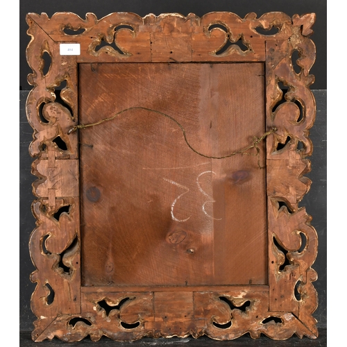 404 - 19th Century Italian School. A Carved Giltwood Florentine Frame, with inset mirror glass, rebate 16.... 