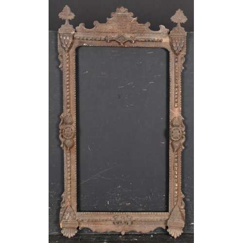 413 - 19th Century Portuguese School. A Carved Wood Ornate Frame, rebate 15.75