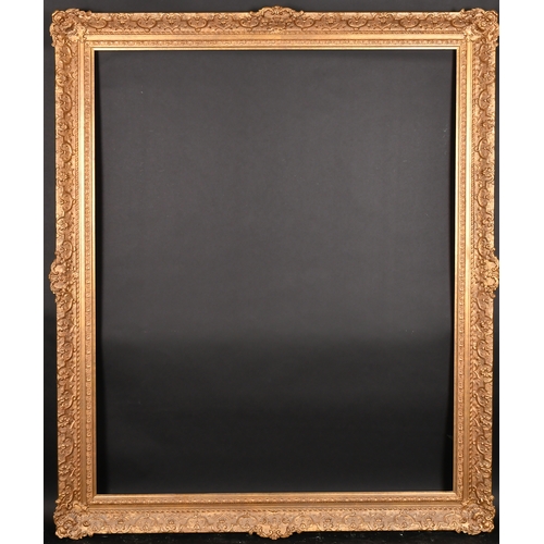 303 - 20th Century English School. A Gilt Composition Frame, with swept centres and corners, rebate 56