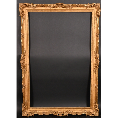 325 - 20th Century English School. A Gilt Composition Frame, with swept and pierced centres and corners, r... 