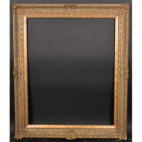 340 - 20th Century English School. A Gilt Composition Frame, with swept centres and corners, rebate 32