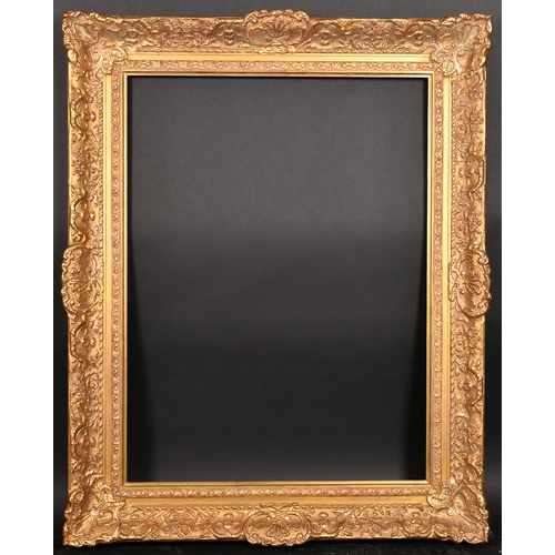 341 - 20th Century English School. A Gilt Composition Frame, with swept centres and corners, rebate 32