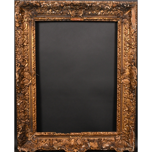 375 - 19th Century French School. A Carved Giltwood Louis Style Frame, with swept centres and corners, reb... 