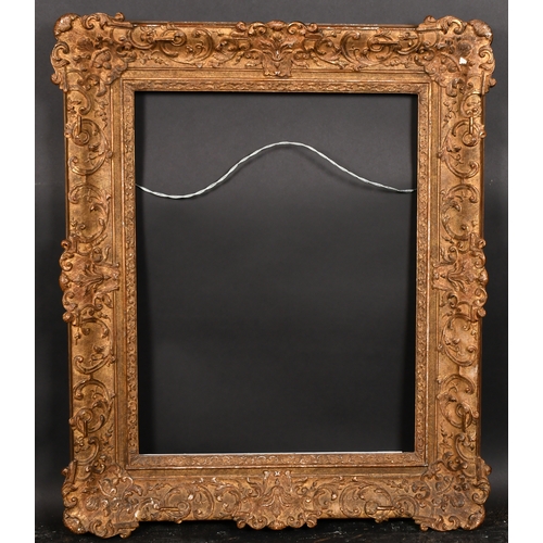 377 - 19th Century French School. A Gilt Composition Louis Style Frame, with swept centres and corners, re... 