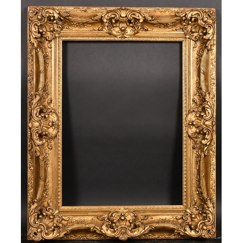 383 - 20th Century English School. A Gilt Composition Frame, with swept and pierced centres and corners , ... 