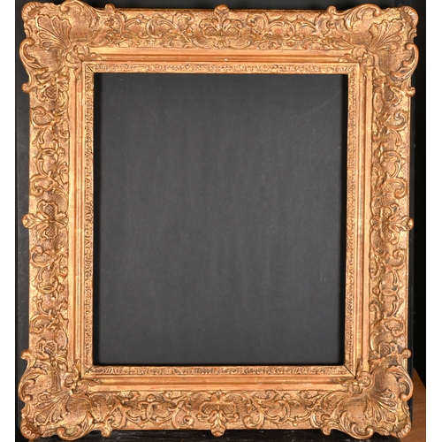 432 - 20th Century European School. A Gilt Composition Louis Style Frame, with swept corners, rebate 18.75... 