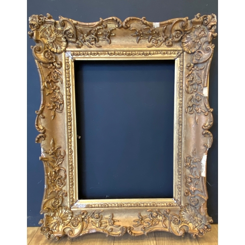 447 - 19th Century English School. A Gilt Composition Frame, with swept corners, rebate 14.25