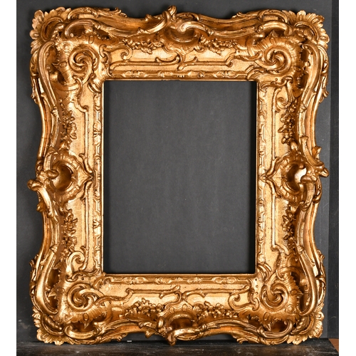 462 - 19th Century English School. A Gilt Composition Frame, with swept and pierced centres and corners, r... 