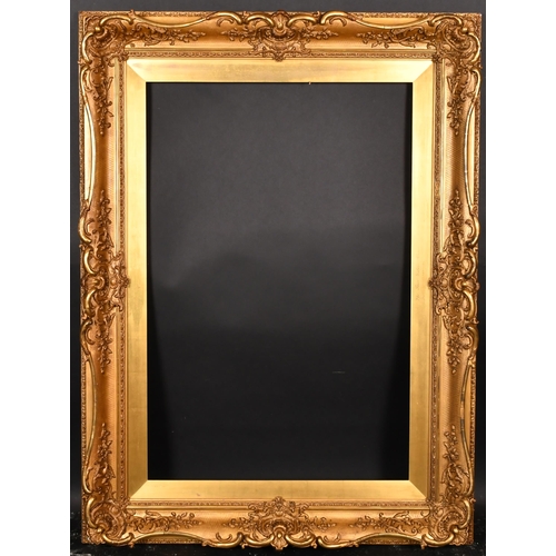 324 - 19th Century English School. A Gilt Composition Frame, with swept centres and corners, rebate 36