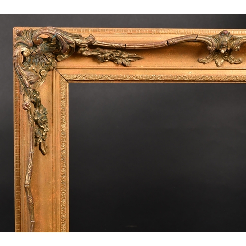 363 - 20th Century English School. A Gilt Composition Frame, with swept centres and corners, rebate 27