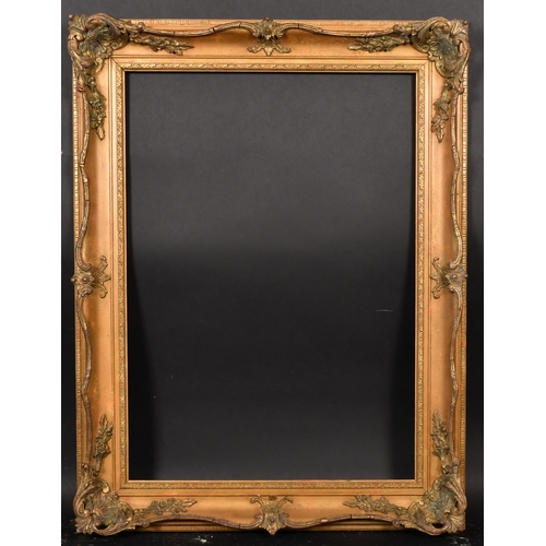 363 - 20th Century English School. A Gilt Composition Frame, with swept centres and corners, rebate 27