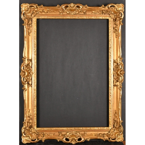 390 - 20th Century English School. A Gilt Composition Frame, with swept and pierced centres and corners, r... 