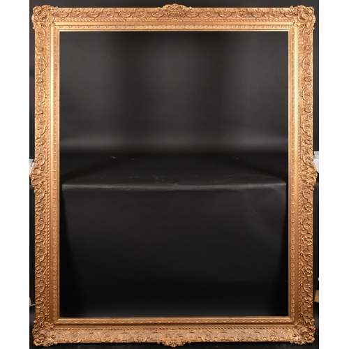 301 - 20th Century English School. A Gilt Composition Frame, with swept centres and corners, rebate 56