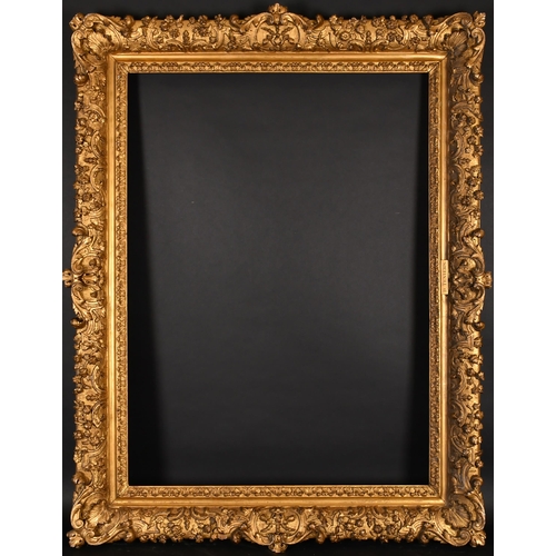 305 - Early 18th Century French School. A Fine Carved and Gilded Oak Regence Frame, with swept centres and... 