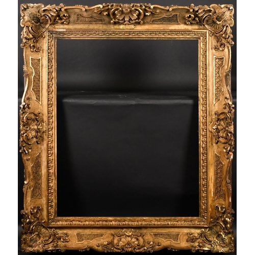 312 - Early 19th Century English School. A Carved Giltwood Frame, with swept centres and corners, rebate 3... 