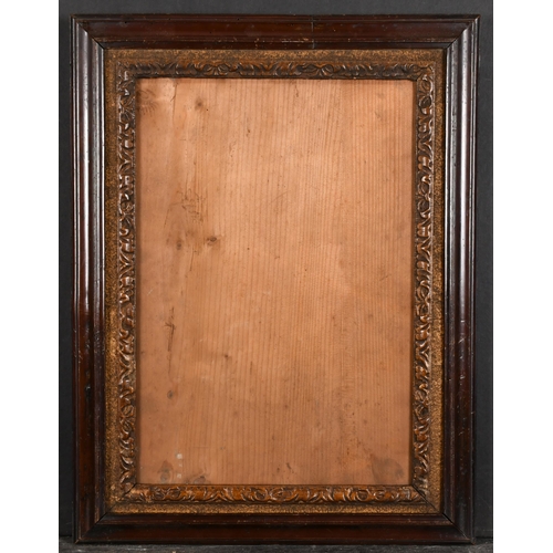 379 - 18th Century English School. A Darkwood Frame, with a carved giltwood slip and inset glass, rebate 1... 