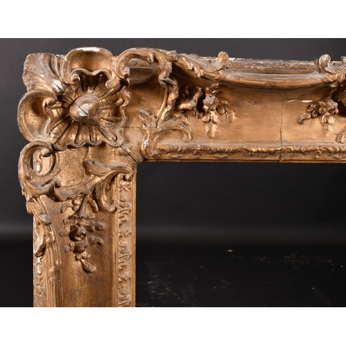 225 - 18th Century French School. A Louis XV Carved Giltwood Frame, with swept and pierced centres and cor... 