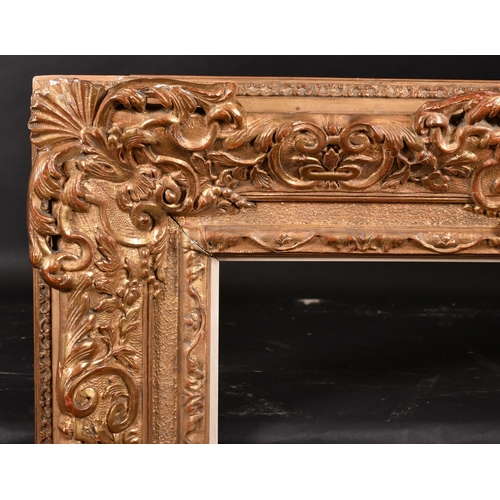 241 - 19th Century French School. A Gilt Composition Frame, with swept and pierced centres and corners, an... 