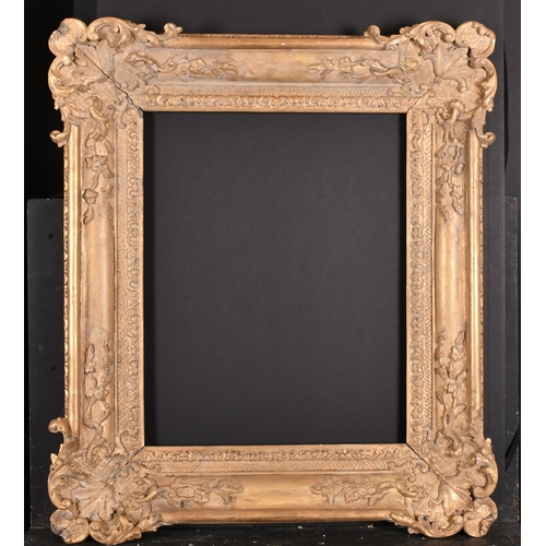 302 - Early 18th Century French School. A Louis XIV Carved Giltwood Frame, with swept corners, rebate 19