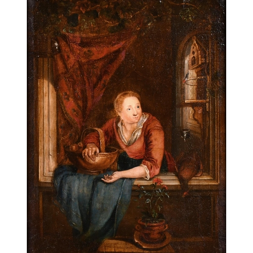 31 - Manner of Willem van Mieris (1662-1747) Dutch. A Lady in a Window, Oil on panel, 7.5