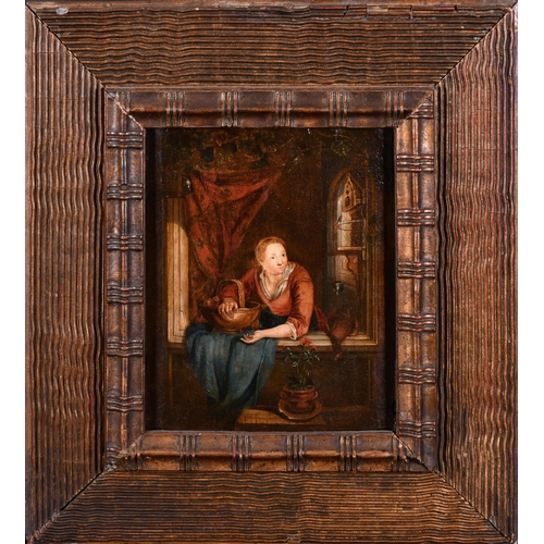 31 - Manner of Willem van Mieris (1662-1747) Dutch. A Lady in a Window, Oil on panel, 7.5